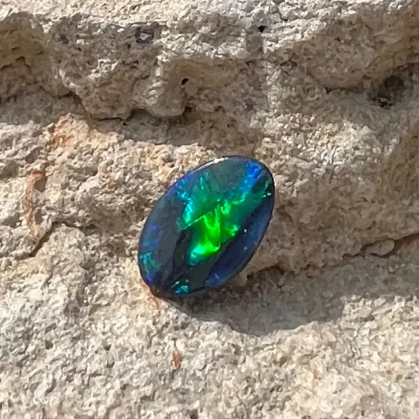 0.61ct Australian Natural Solid Black Opal Featuring Green Blue Purple 1
