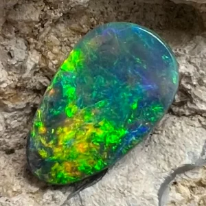 0.91 Ct Australian Natural Solid Black Opal Featuring Green Purple Gold 1