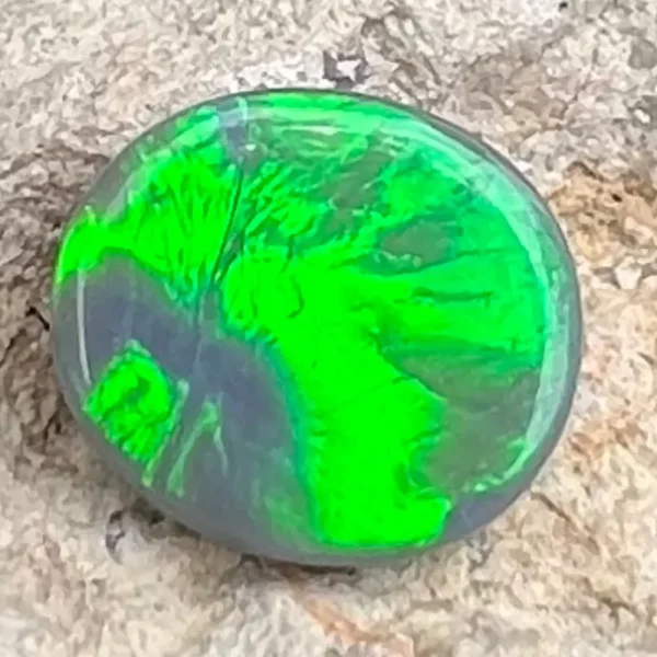 2.48ct Australian Natural Solid Black Opal Featuring Fluorescent Green 1